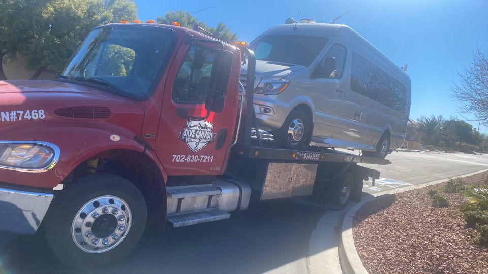 Sprinter RV van on a Skye Canyon Towing flatbed in Summerlin